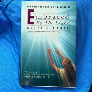 Embraced by the light book